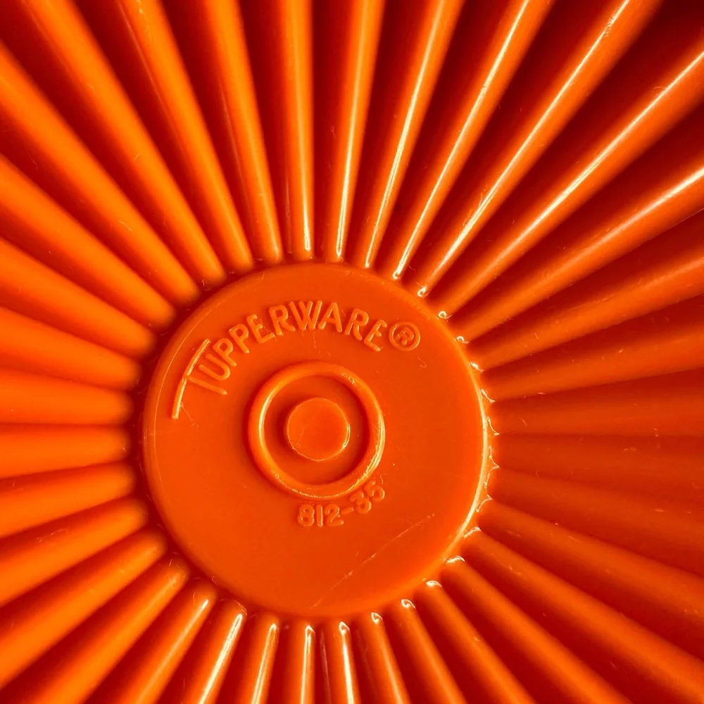 Vintage Tupperware servalier bowl orange with lid holds 2 cups